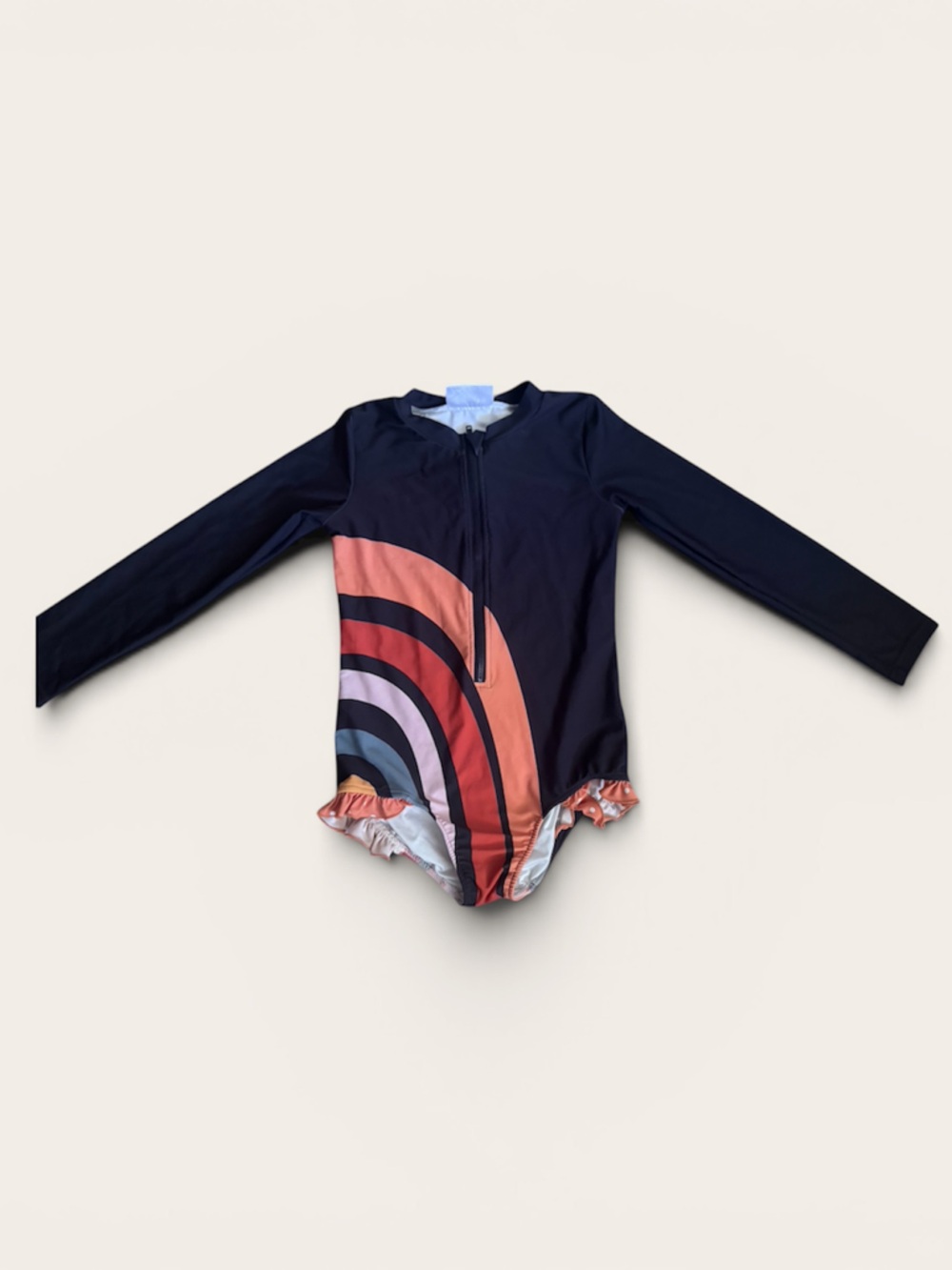 Oopsie Daisy girls long sleeve Navy and rainbow swimsuit. UV protection